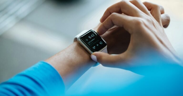 Person wearing a smartwatch on their wrist