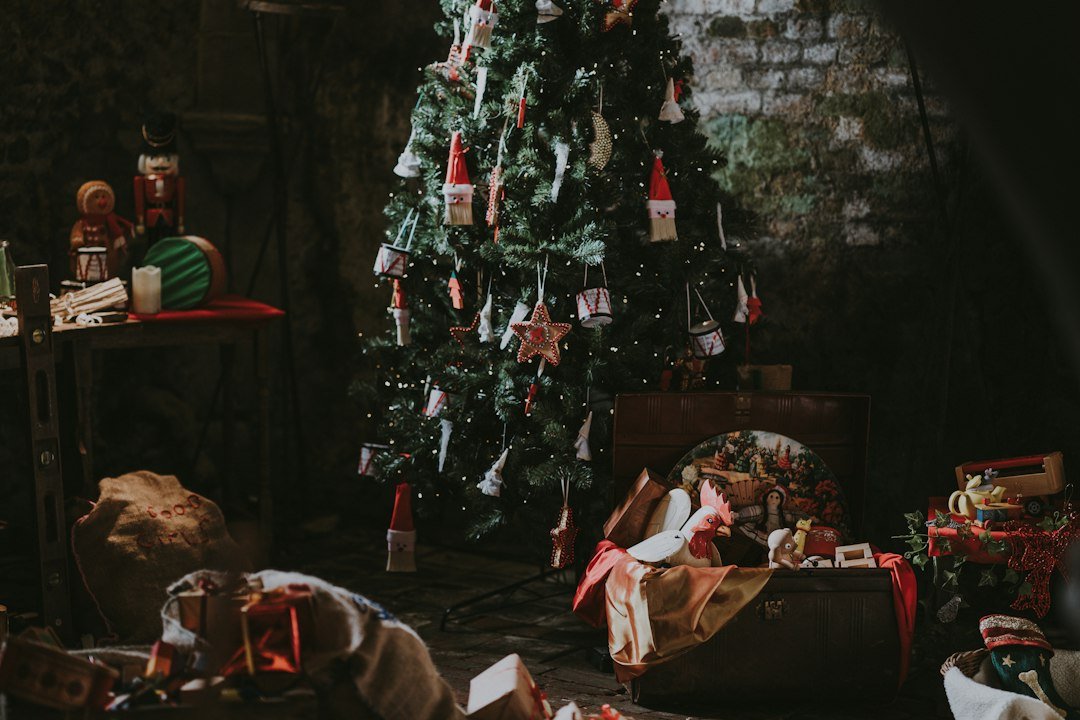 Christmas tree with wrapped gifts - best Christmas tech gifts UK 2026