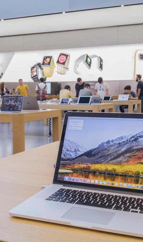 Laptops on display in an electronics store